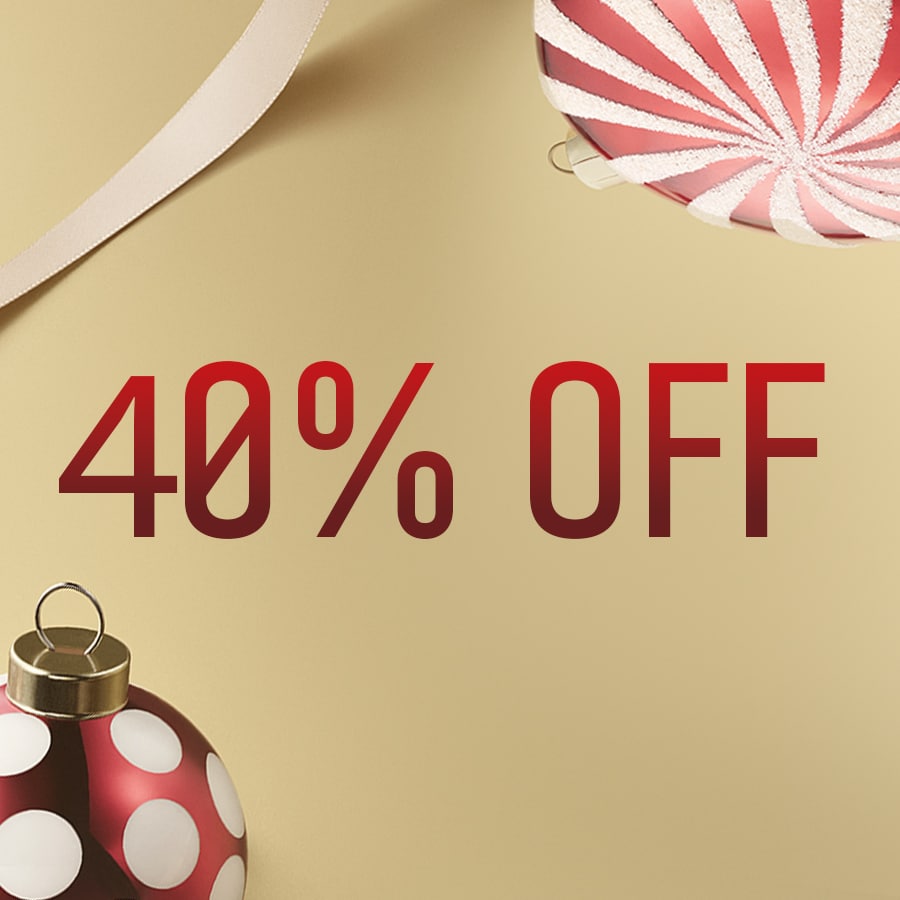 Close up of Long-Wear Cream Shadow Stick with swatch behind on top of a soft-grey background